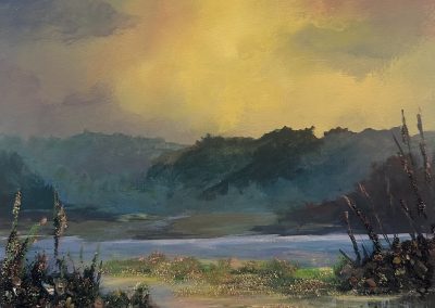 Sunset sky, blue mountains, gemstones and glass in foreground