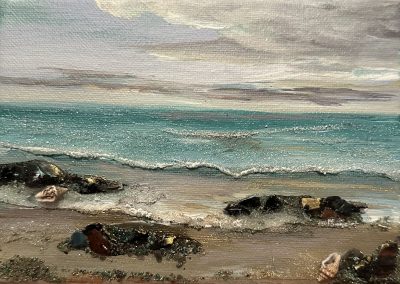 Seascape with teal water, gemstones, seashells
