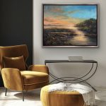 A glowing sunrise over water with golden reflections and shimmering accents of glass, glitter, and mica.