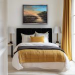 A glowing sunrise over water with golden reflections and shimmering accents of glass, glitter, and mica.