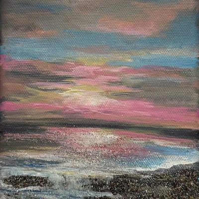 7x5 seascape with glowing pink and gold sunset, shimmering gemstones and mica on the shore, framed in a floater frame.